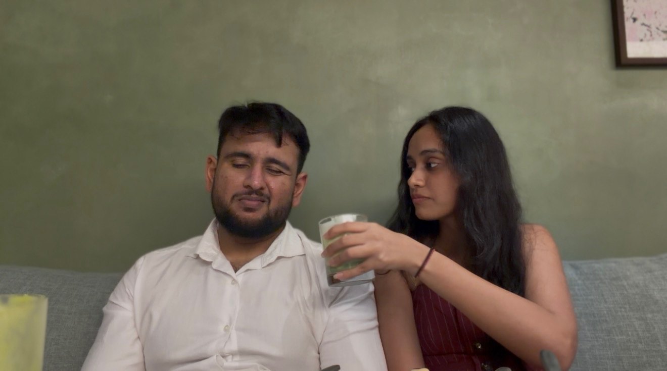 A playful candid moment between Yashika and Amol